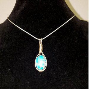 Caged Turquoise Cabachon on Sterling Silver